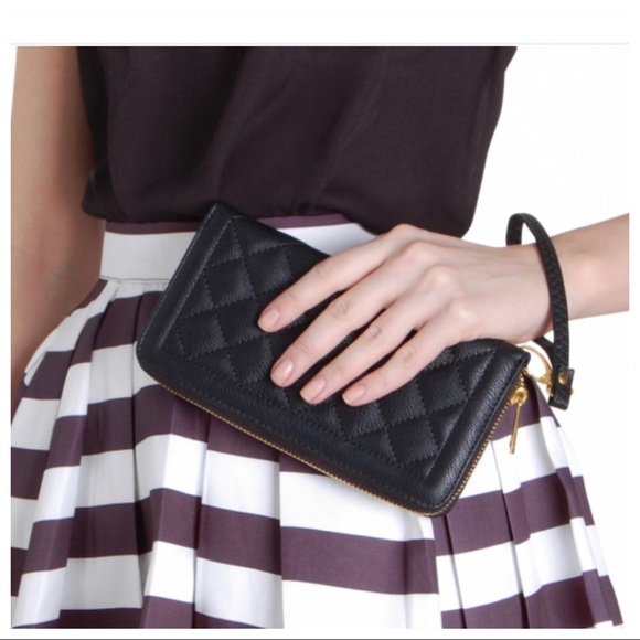 ShopEvelynne Handbags - Vegan  leather zip-around wallet interior coin purse and multiple card slots.